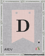 A taped needlepoint canvas with the design: Banner 18 mesh count Forked D Black on Pink.