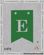 A taped needlepoint canvas with the design: Banner 18 mesh count Forked E White on Green.