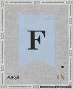 A taped needlepoint canvas with the design: Banner 18 mesh count Forked F Black on Light Blue.
