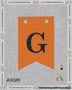 A taped needlepoint canvas with the design: Banner 18 mesh count Forked G Black on Orange.