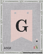 A taped needlepoint canvas with the design: Banner 18 mesh count Forked G Black on Pink.