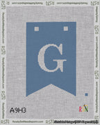 A taped needlepoint canvas with the design: Banner 18 mesh count Forked G White on Blue.