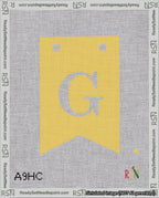 A taped needlepoint canvas with the design: Banner 18 mesh count Forked G White on Yellow.