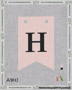 A taped needlepoint canvas with the design: Banner 18 mesh count Forked H Black on Pink.