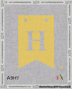 A taped needlepoint canvas with the design: Banner 18 mesh count Forked H White on Yellow.