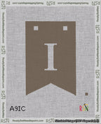 A taped needlepoint canvas with the design: Banner 18 mesh count Forked I White on Brown.