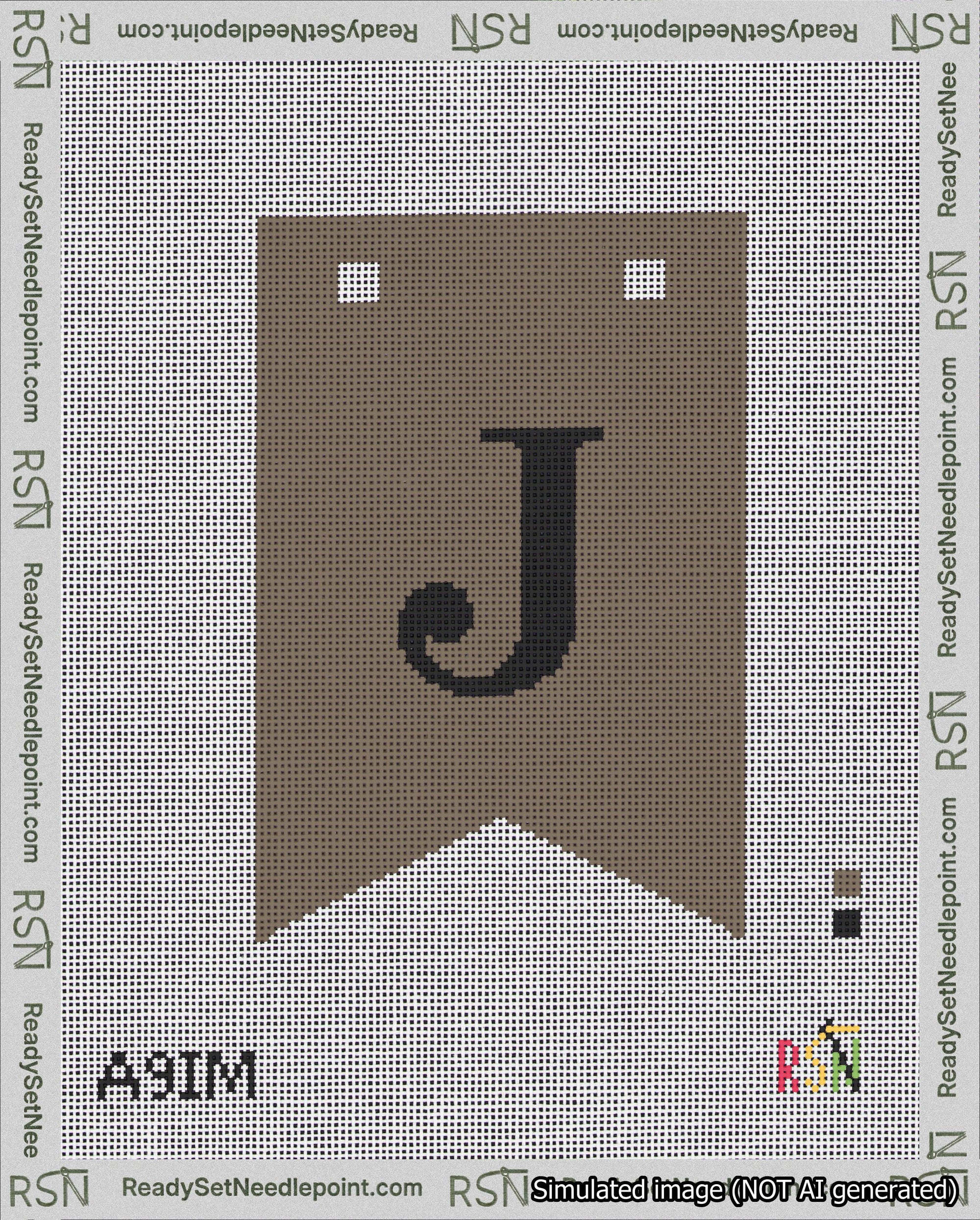 A taped needlepoint canvas with the design: Banner 18 mesh count Forked J Black on Brown.