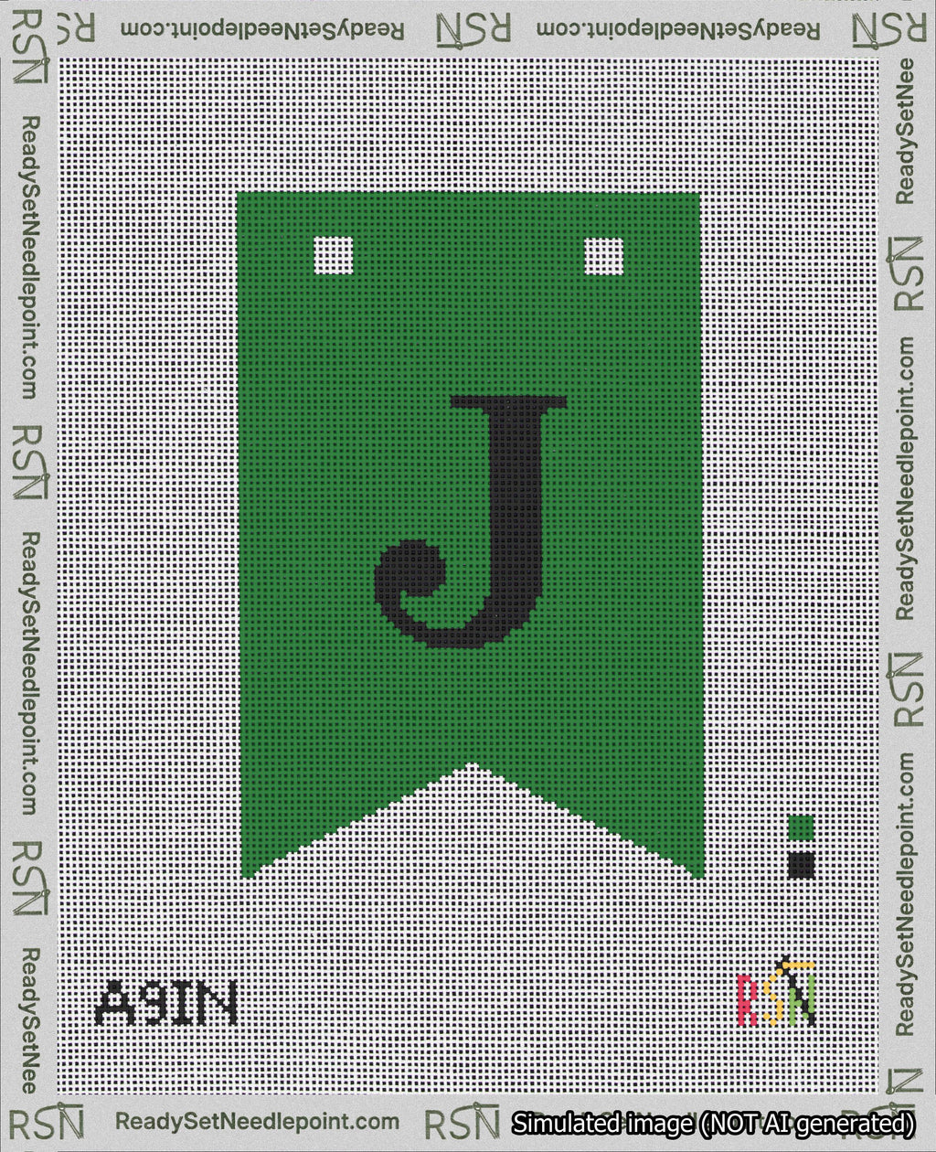 A taped needlepoint canvas with the design: Banner 18 mesh count Forked J Black on Green.