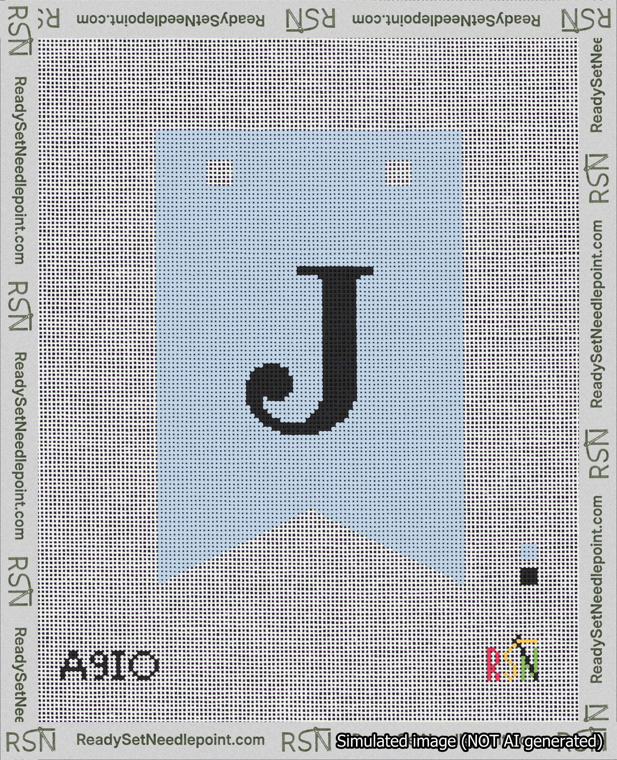 A taped needlepoint canvas with the design: Banner 18 mesh count Forked J Black on Light Blue.