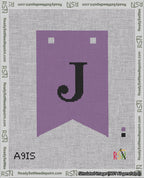 A taped needlepoint canvas with the design: Banner 18 mesh count Forked J Black on Purple.