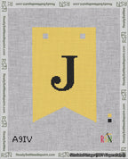 A taped needlepoint canvas with the design: Banner 18 mesh count Forked J Black on Yellow.