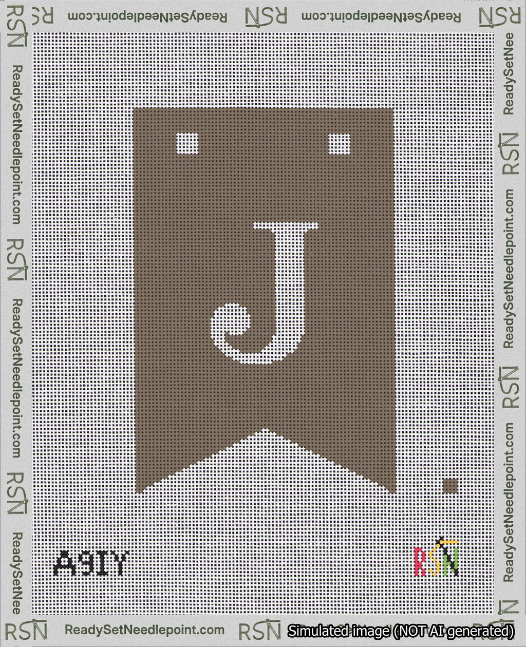 A taped needlepoint canvas with the design: Banner 18 mesh count Forked J White on Brown.