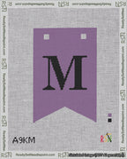 A taped needlepoint canvas with the design: Banner 18 mesh count Forked M Black on Purple.