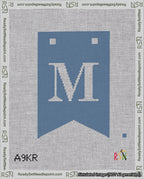 A taped needlepoint canvas with the design: Banner 18 mesh count Forked M White on Blue.