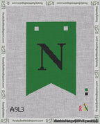A taped needlepoint canvas with the design: Banner 18 mesh count Forked N Black on Green.