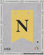 A taped needlepoint canvas with the design: Banner 18 mesh count Forked N Black on Yellow.