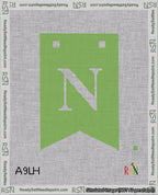 A taped needlepoint canvas with the design: Banner 18 mesh count Forked N White on Light Green.