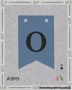 A taped needlepoint canvas with the design: Banner 18 mesh count Forked O Black on Blue.