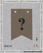 A taped needlepoint canvas with the design: Banner 18 mesh count Forked Question Black on Brown.