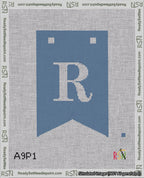 A taped needlepoint canvas with the design: Banner 18 mesh count Forked R White on Blue.