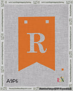 A taped needlepoint canvas with the design: Banner 18 mesh count Forked R White on Orange.