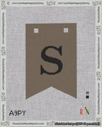A taped needlepoint canvas with the design: Banner 18 mesh count Forked S Black on Brown.