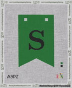 A taped needlepoint canvas with the design: Banner 18 mesh count Forked S Black on Green.