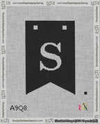 A taped needlepoint canvas with the design: Banner 18 mesh count Forked S White on Black.