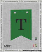 A taped needlepoint canvas with the design: Banner 18 mesh count Forked T Black on Green.
