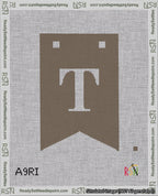 A taped needlepoint canvas with the design: Banner 18 mesh count Forked T White on Brown.