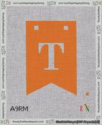 A taped needlepoint canvas with the design: Banner 18 mesh count Forked T White on Orange.