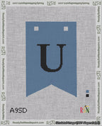 A taped needlepoint canvas with the design: Banner 18 mesh count Forked U Black on Blue.