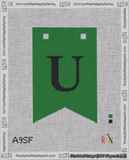A taped needlepoint canvas with the design: Banner 18 mesh count Forked U Black on Green.