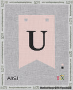 A taped needlepoint canvas with the design: Banner 18 mesh count Forked U Black on Pink.