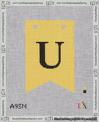 A taped needlepoint canvas with the design: Banner 18 mesh count Forked U Black on Yellow.