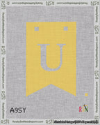 A taped needlepoint canvas with the design: Banner 18 mesh count Forked U White on Yellow.