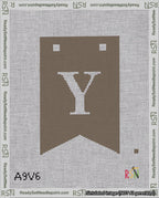 A taped needlepoint canvas with the design: Banner 18 mesh count Forked Y White on Brown.