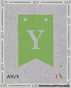 A taped needlepoint canvas with the design: Banner 18 mesh count Forked Y White on Light Green.