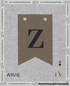 A taped needlepoint canvas with the design: Banner 18 mesh count Forked Z Black on Brown.