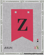 A taped needlepoint canvas with the design: Banner 18 mesh count Forked Z Black on Red.