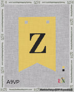 A taped needlepoint canvas with the design: Banner 18 mesh count Forked Z Black on Yellow.