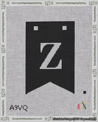 A taped needlepoint canvas with the design: Banner 18 mesh count Forked Z White on Black.