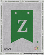 A taped needlepoint canvas with the design: Banner 18 mesh count Forked Z White on Green.