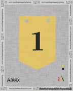 A taped needlepoint canvas with the design: Banner 18 mesh count Pointed 1 Black on Yellow.