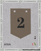 A taped needlepoint canvas with the design: Banner 18 mesh count Pointed 2 Black on Brown.