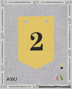 A taped needlepoint canvas with the design: Banner 18 mesh count Pointed 2 Black on Yellow.