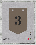 A taped needlepoint canvas with the design: Banner 18 mesh count Pointed 3 Black on Brown.