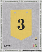 A taped needlepoint canvas with the design: Banner 18 mesh count Pointed 3 Black on Yellow.