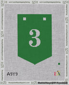 A taped needlepoint canvas with the design: Banner 18 mesh count Pointed 3 White on Green.