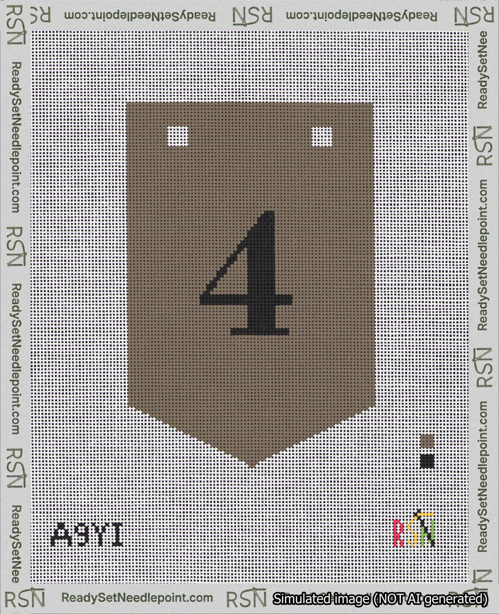 A taped needlepoint canvas with the design: Banner 18 mesh count Pointed 4 Black on Brown.